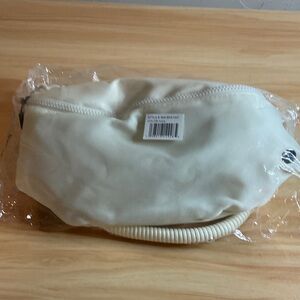 BearPaw Cream Crossbody Belt Bag with Coil Strap